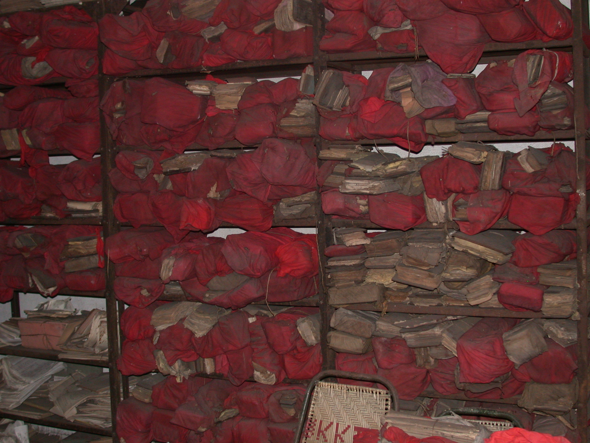 Ayurvedic treatises are stored between two wooden boards and wrapped in cloth Ayurvedic treatises are stored between two wooden boards and wrapped in cloth